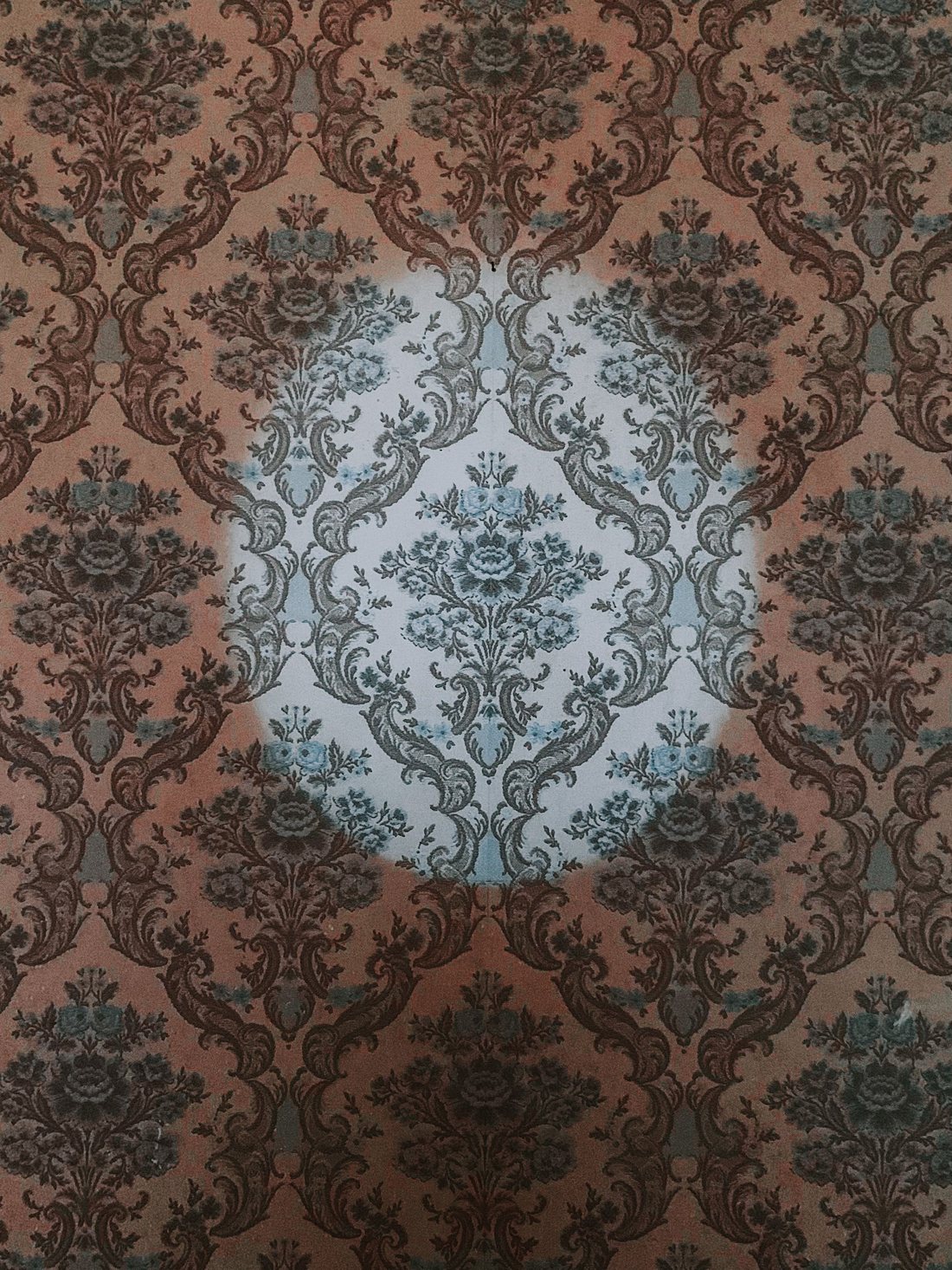 Rich brown damask wallcovering detail