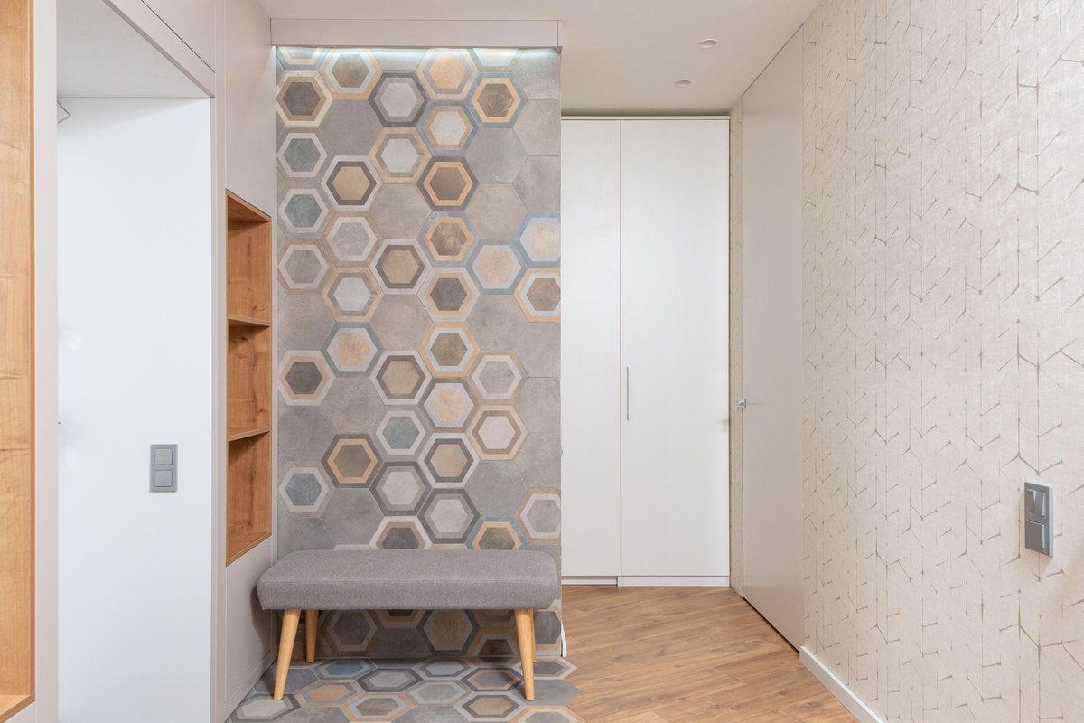 Softly patterned wallcovering in a bright residential hallway